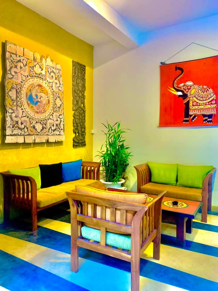 Gangula Villa room interior with lush garden visible through window