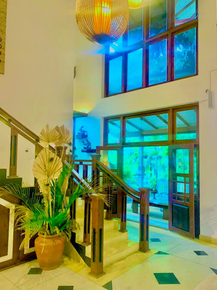 Gangula Villa portrait view of villa room with warm ambient lighting