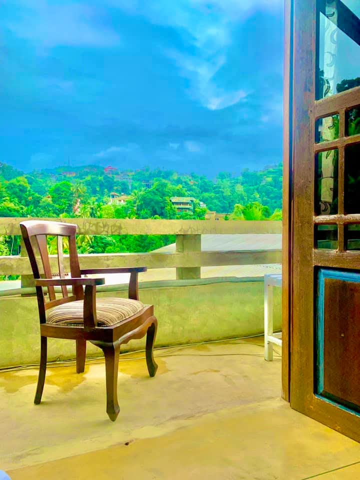 Gangula Villa guest room with private balcony and garden views